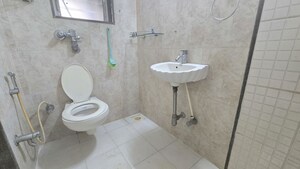 Bathroom in 1 BHK Apartment at Agarwal Trinity Towers, Malad West – for Rent