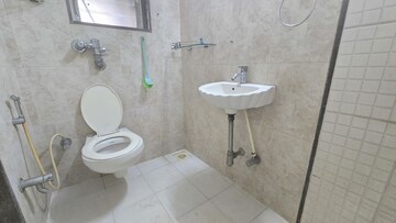 Bathroom in 1 BHK Apartment at Agarwal Trinity Towers, Malad West – for Rent