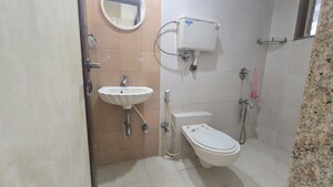Bathroom in 1 BHK Apartment at Agarwal Trinity Towers, Malad West – for Rent