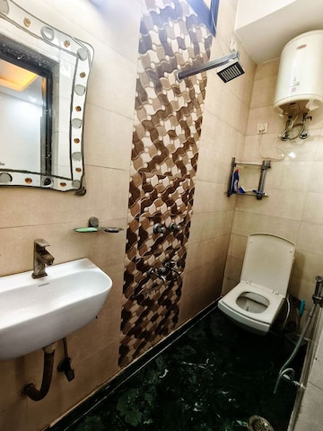 Bathroom in 3 BHK Apartment at Malviya Nagar – for Rent