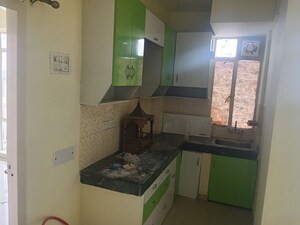 Kitchen in 1.5 BHK Apartment at Zara Aavaas, Sector 104 – for Rent