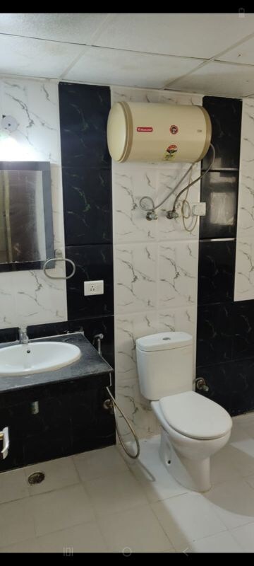 Bathroom in 3 BHK Apartment at Nimbus The Hyde park, Sector 78 – for Rent