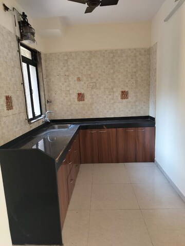 Kitchen in 1 BHK Apartment at Kavya Hill View CHS, Anand Nagar – for Sale