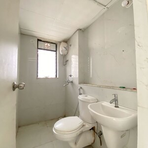 Bathroom in 1 BHK Apartment at Runwal Gardens Phase I, Bhadra Nagar – for Sale