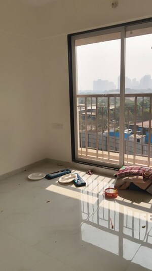 Bedroom in 1 BHK Apartment at Metropolis Bayside, Kasarvadavali – for Rent