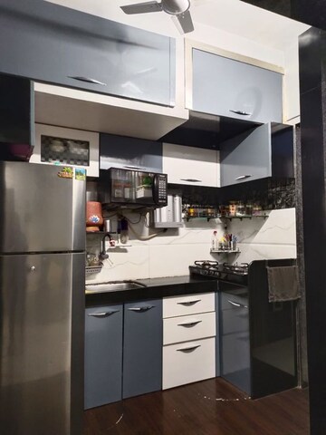 Kitchen in 2 BHK Apartment at Laxmi Plaza, Patlipada – for Rent