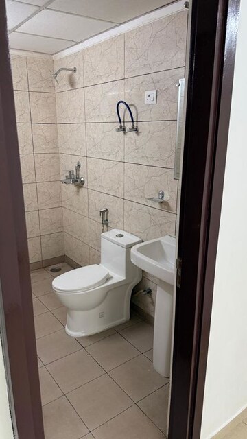 Bathroom in 2.5 BHK Apartment at Gulshan Botnia, Sector 144 – for Rent