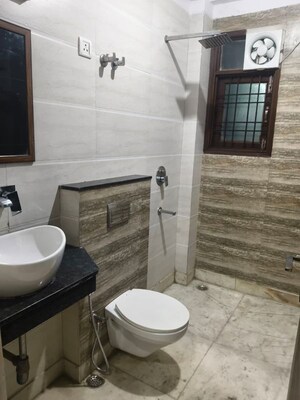 Bathroom in 3 BHK Apartment at Vishwakarma Colony – for Sale