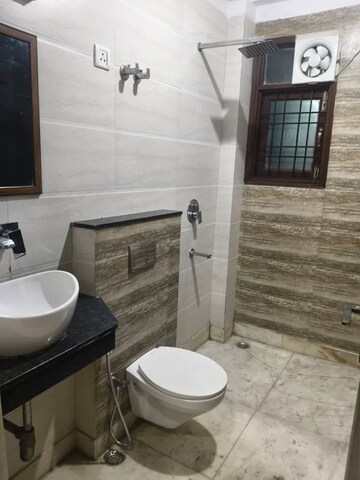 Bathroom in 3 BHK Apartment at Vishwakarma Colony – for Sale