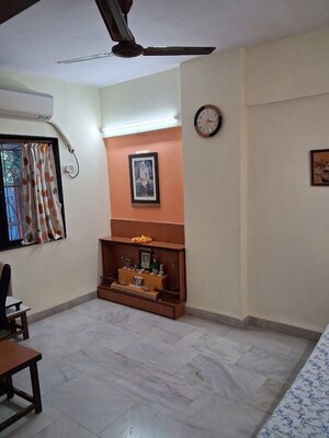 Bedroom in 2 BHK Apartment at New Jagruti CHS, Dahisar West – for Sale