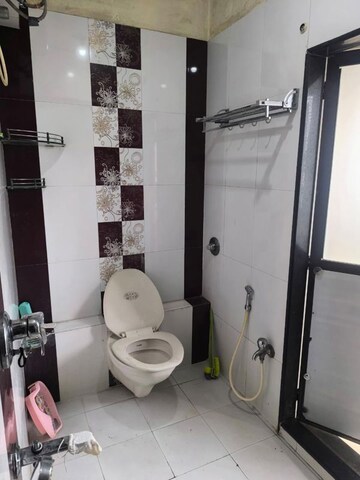 Bathroom in 1 BHK Apartment at K Raheja Palm Court, Malad West – for Rent