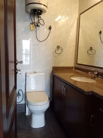 Bathroom in 3 BHK Builder Floor at Nehru Enclave – for Rent