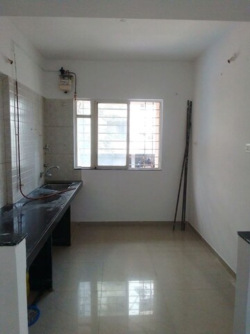 Kitchen in 2 BHK Apartment at Essen Shonest Towers, Wakad – for Sale