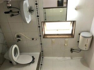 Bathroom in 4 BHK Apartment at Andheri West – for Rent
