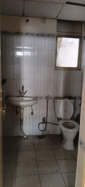 Bathroom in 2 BHK Apartment at River Heights Plaza, Raj Nagar Extension – for Sale