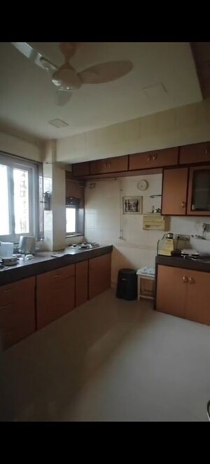 Kitchen in 2 BHK Apartment at Garden Rose, Andheri West – for Sale