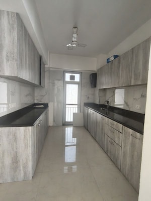 Kitchen in 3 BHK Apartment at Ruparel Ariana, Parel – for Rent