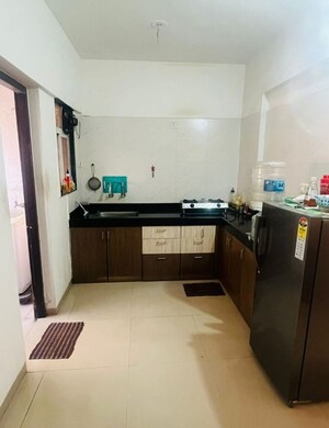 Kitchen in 2 BHK Apartment at Greenland Society, Pimple Saudagar – for Rent
