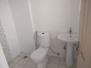 Bathroom in 2 BHK Apartment at Amrapali Zodiac, Sector 120 – for Rent