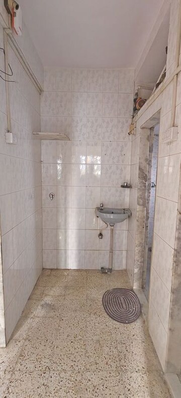 Bathroom in 1 BHK Apartment at Asmita Jyoti CHS, Malad West – for Rent