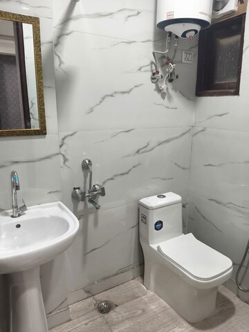 Bathroom in 4 BHK Apartment at Vasant Kunj – for Rent