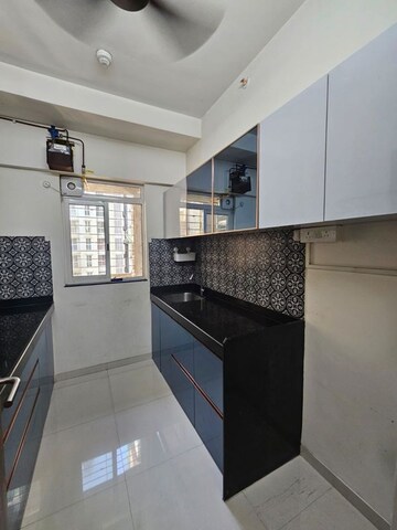 Kitchen in 1 BHK Apartment at Lodha Amara, Kolshet Road – for Rent