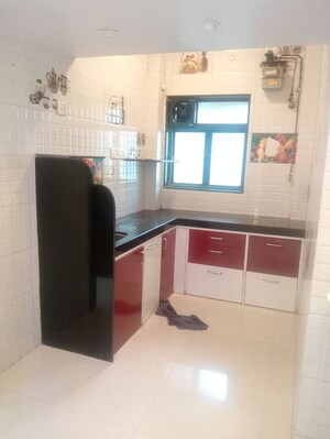 Kitchen in 2 BHK Apartment at National Milloni, Nerul – for Sale