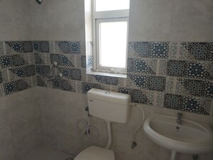 Bathroom in 3 BHK Apartment at Signature Global Golf Greens, Sector 79 – for Sale