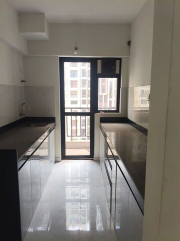 Kitchen in 2 BHK Apartment at Runwal Gardens Phase I, Dombivli East – for Rent