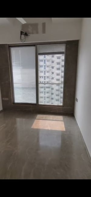 Room in 3 BHK Apartment at Laxmi Raajvilas, Goregaon West – for Sale