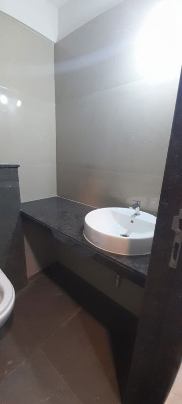 Bathroom in 1 BHK Apartment at Ajmera Boulevard, Malad West – for Rent