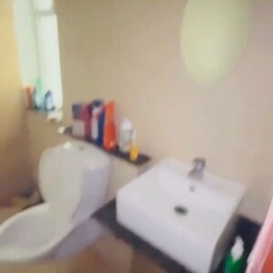Bathroom in 2 BHK Apartment at International Airport Road – for Sale
