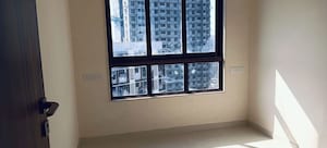 Room in 2 BHK Apartment at Sunteck City Avenue 1, Goregaon West – for Rent
