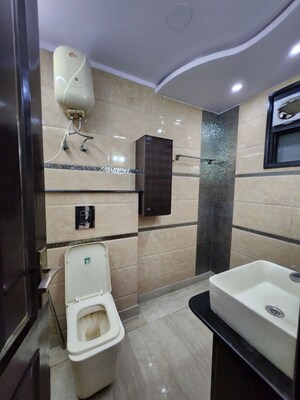 Bathroom in 3 BHK Builder Floor at Paschim Vihar – for Rent
