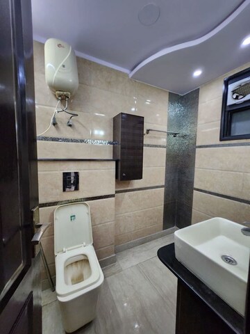 Bathroom in 3 BHK Builder Floor at Paschim Vihar – for Rent