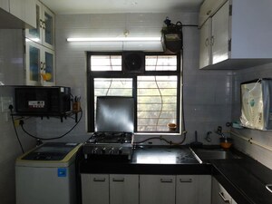 Kitchen in 2 BHK Apartment at Divya Smit, Kandivali West – for Sale