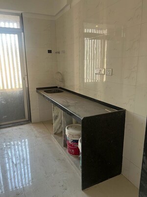 Kitchen in 3 BHK Apartment at Shreeji Atlantis, Malad West – for Rent