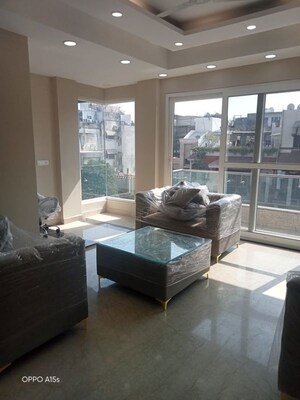 Living Room in 4 BHK Apartment at Jasola – for Sale