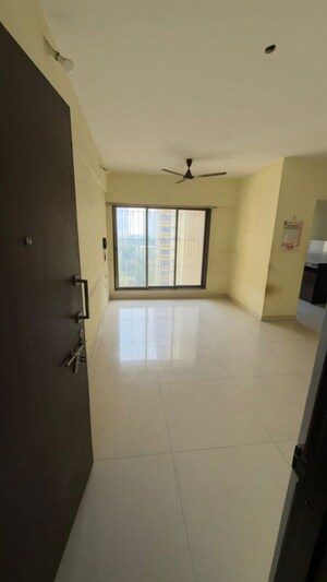 Living Room in 2 BHK Apartment at Runwal Garden City, Balkum Pada – for Rent