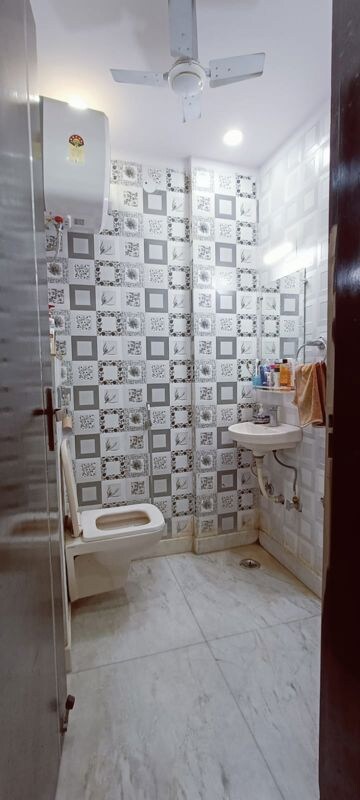 Bathroom in 2 BHK Apartment at Apex Anuradha Apartments, Paschim Vihar – for Rent