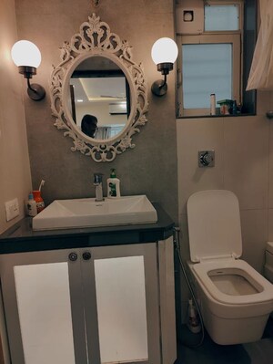 Bathroom in 2 BHK Apartment at Goyal Green Woods, Andheri East – for Rent