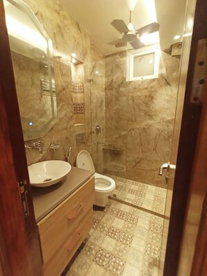 Bathroom in 4 BHK Builder Floor at Ansal API Esencia, Sector 67 – for Rent