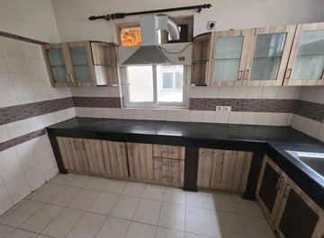 Kitchen in 4 BHK Apartment at Orchid Petals, Sector 49 – for Sale