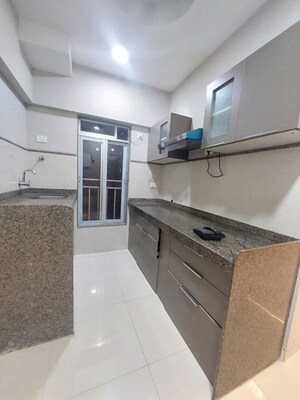 Kitchen in 2 BHK Apartment at Je and Vee Madhuban, Malad East – for Rent