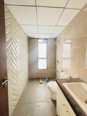 Bathroom in 4 BHK Apartment at Kalpataru Vista, Sector 128 – for Sale