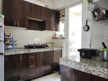 Kitchen in 2.5 BHK Apartment at 3C Lotus Zing, Sector 168 – for Rent