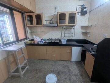 Kitchen in 2 BHK Apartment at Asha Nagar CHS, Asha Nagar – for Rent