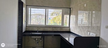 Kitchen in 2 BHK Apartment at Swojas Advait, Shivajinagar – for Sale
