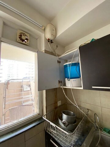 Kitchen in 3.5 BHK Apartment at Puri Pranayam, Sector 82 – for Sale