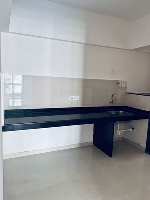 Kitchen in 3 BHK Apartment at Kohinoor Viva City, Dhanori – for Rent